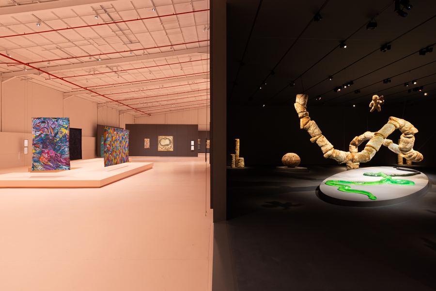 Installation view, split gallery hall with sculptural work, JAX District