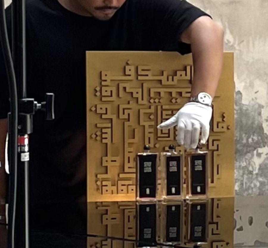 Serge Lutens 11:11 Campaign, Kufi Maze, with the three 11:11 bottles
